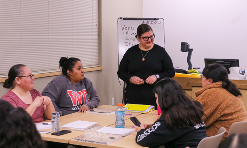 YVC instructor address table of students during class. 