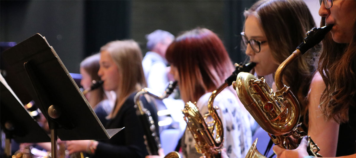 YVC Jazz group plays instruments during performance.