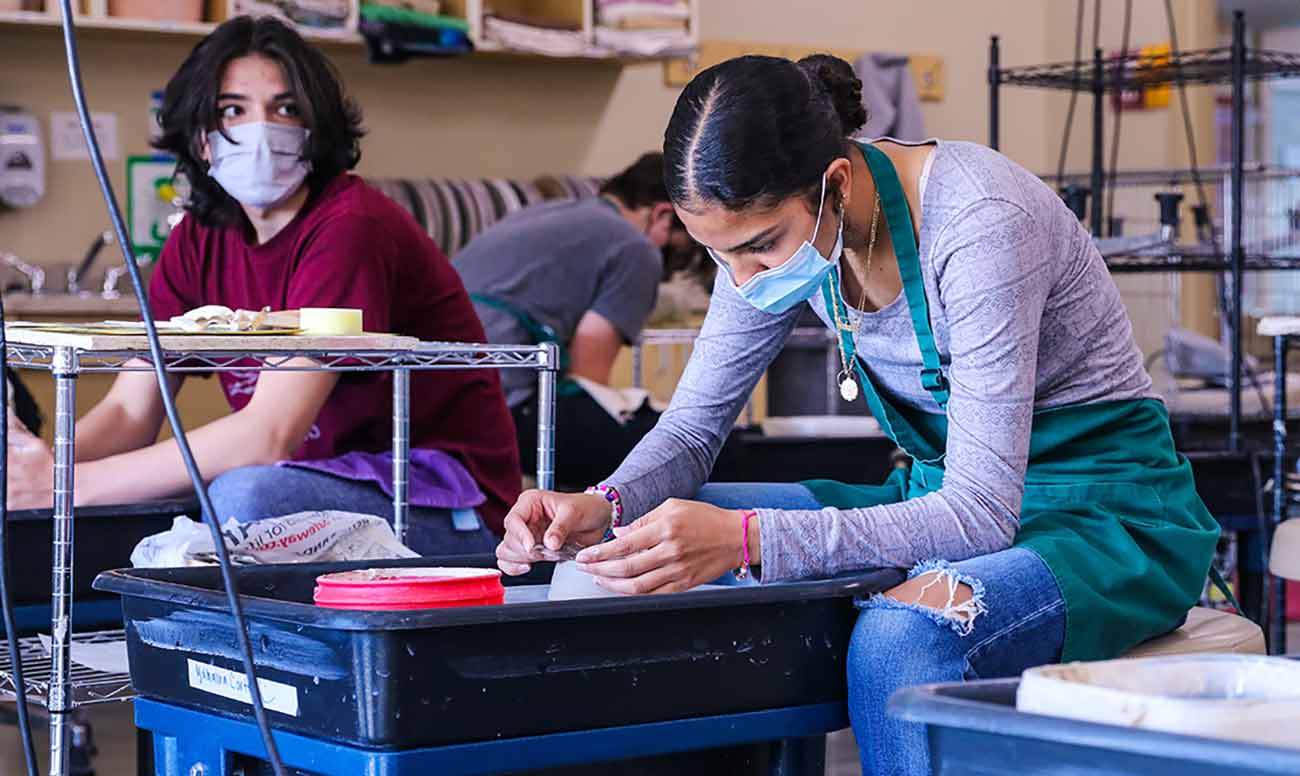 Students in clay class