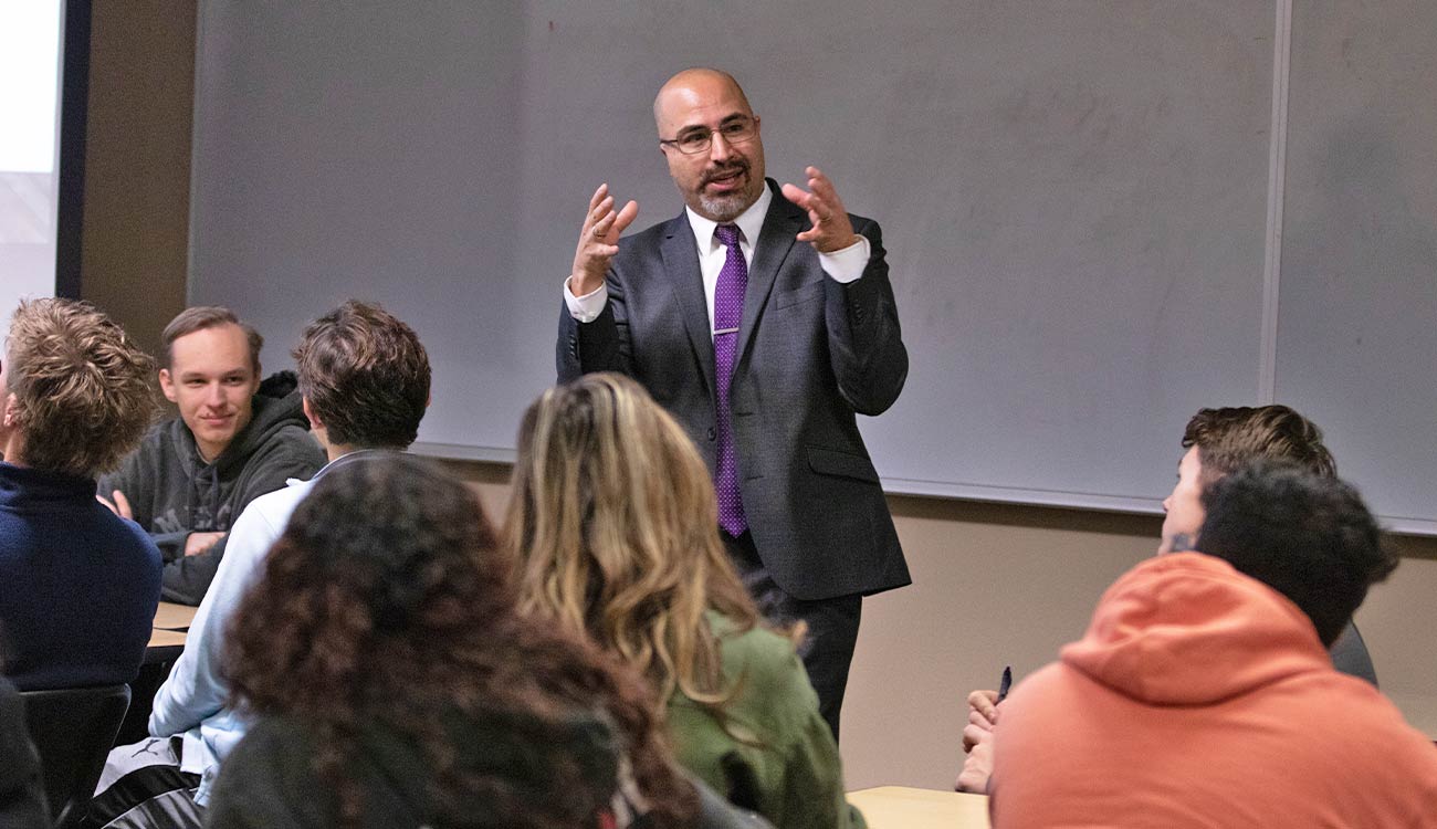 Instructor talks to class