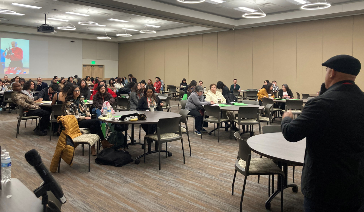 Students listen to a speaker