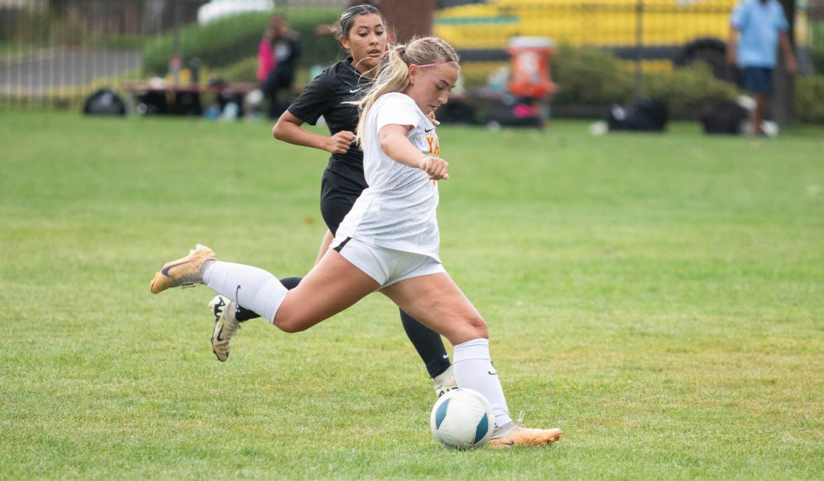 Yakima Valley College women's soccer player prepares to kick ball during game