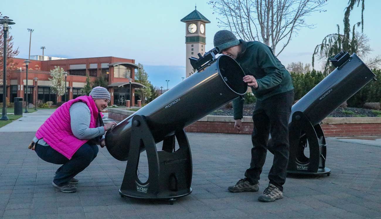 Instructors set up telescope