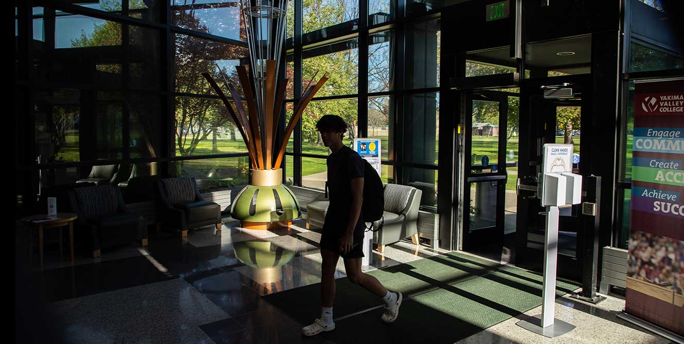 A students walks in Deccio Higher Education Center