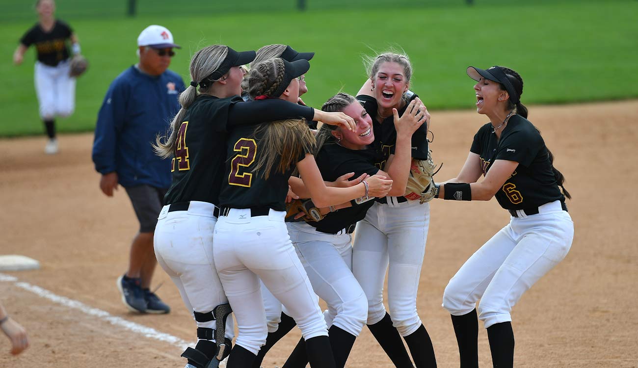 YVC softball players celebrate victory