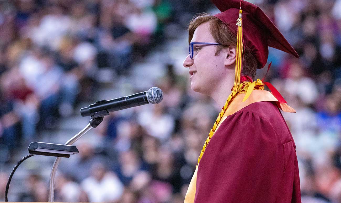 YVC Student Speaker addresses the audience during Commencement. 