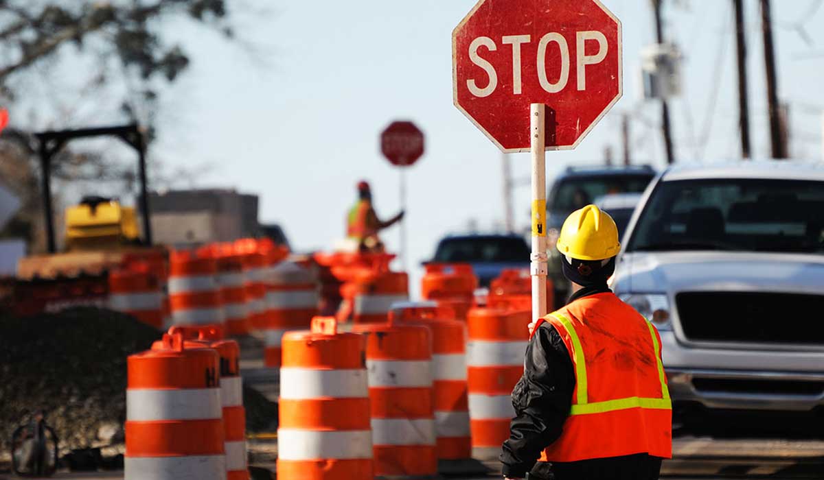 Flaggers holding stop signs