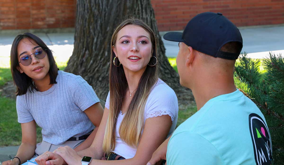 Students talk on campus